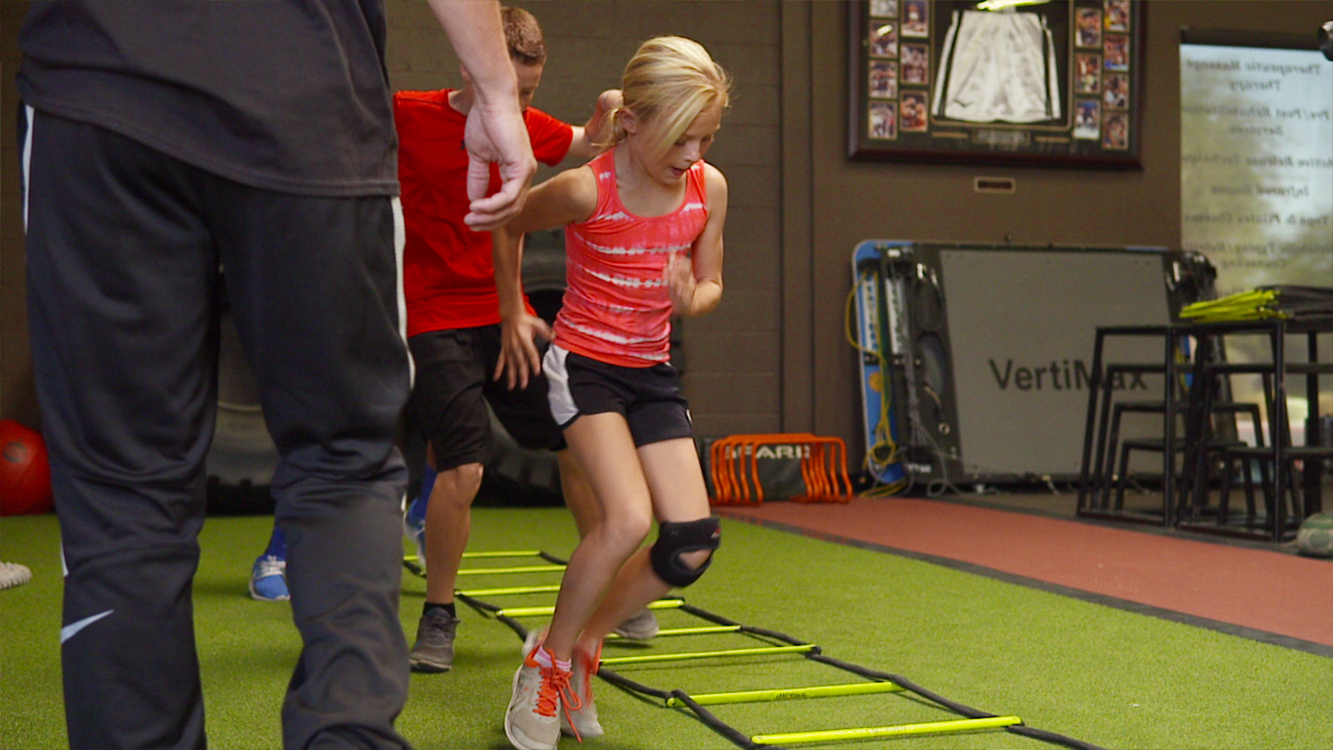 Kid running in agility class